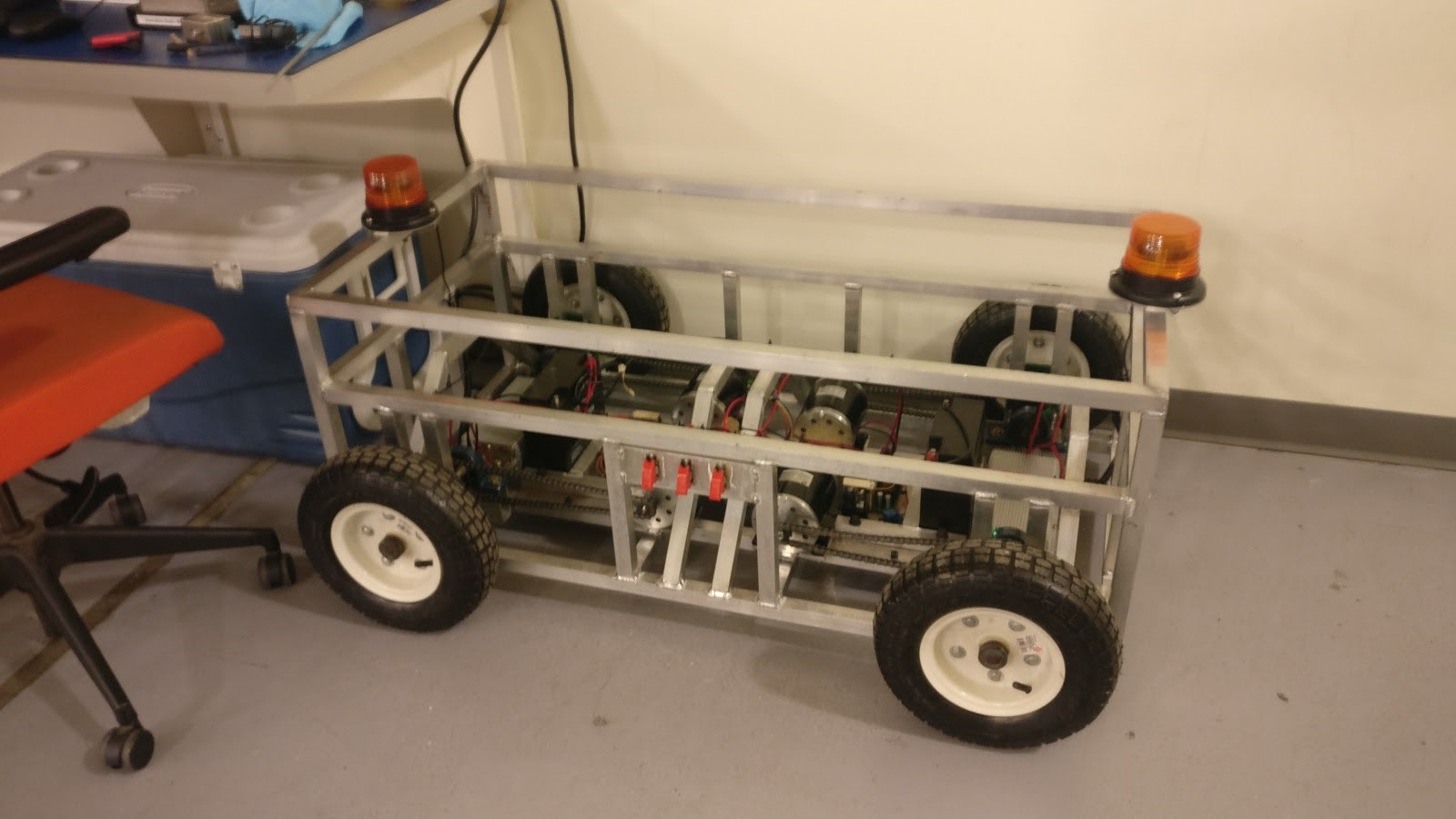 The robotic mule in its first iteration of construction. Four wheels hug a sturdy aluminum frame, which can carry up to 1000lbs